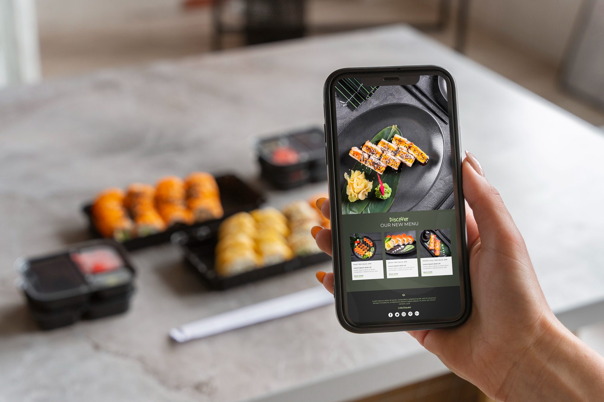 Person ordering sushi via a mobile app with sushi trays in the background.